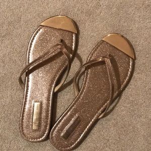 Inc rose gold flip flops